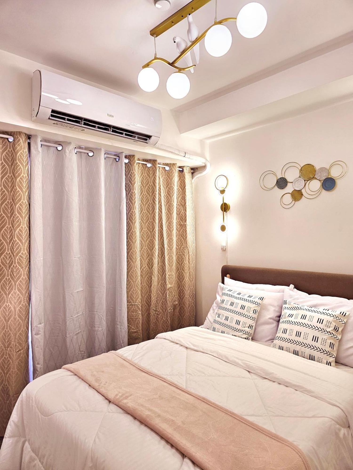 كويزون سيتي Acellyne'S Suites At The Residences At Commonwealth By Century المظهر الخارجي الصورة