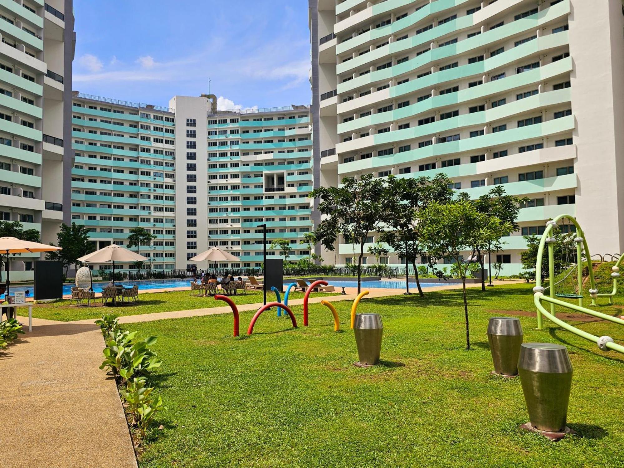 كويزون سيتي Acellyne'S Suites At The Residences At Commonwealth By Century المظهر الخارجي الصورة