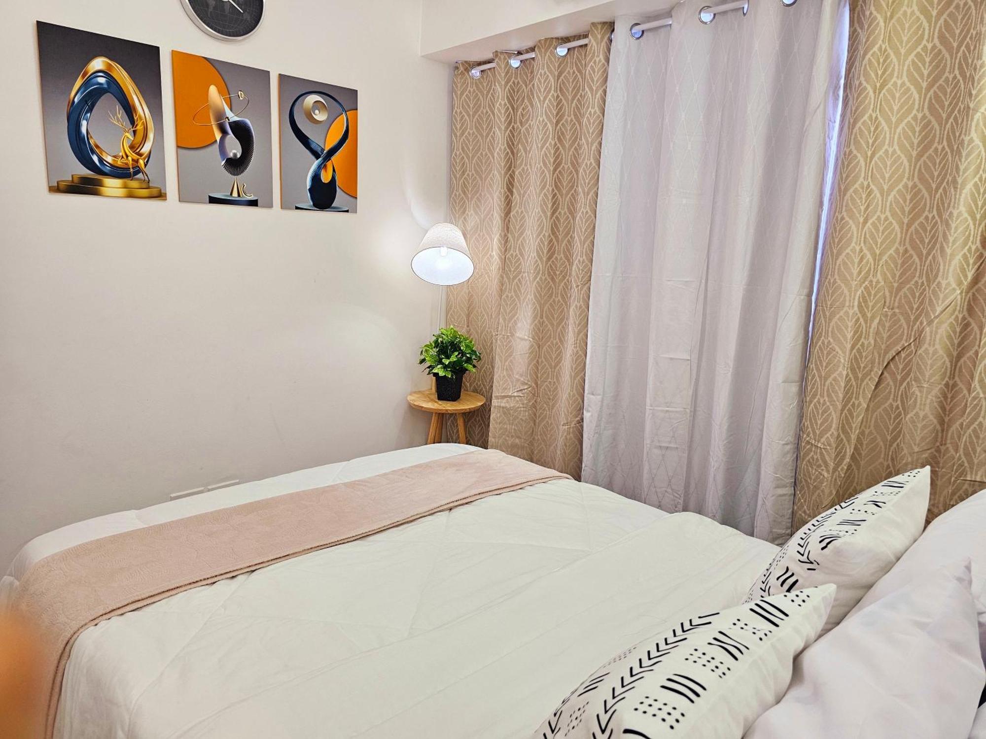 كويزون سيتي Acellyne'S Suites At The Residences At Commonwealth By Century المظهر الخارجي الصورة